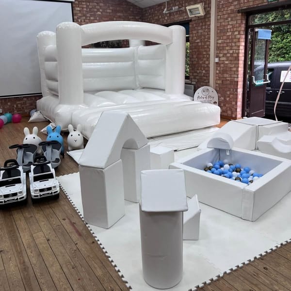 Glow & Gather | White Bouncy Castle Hire